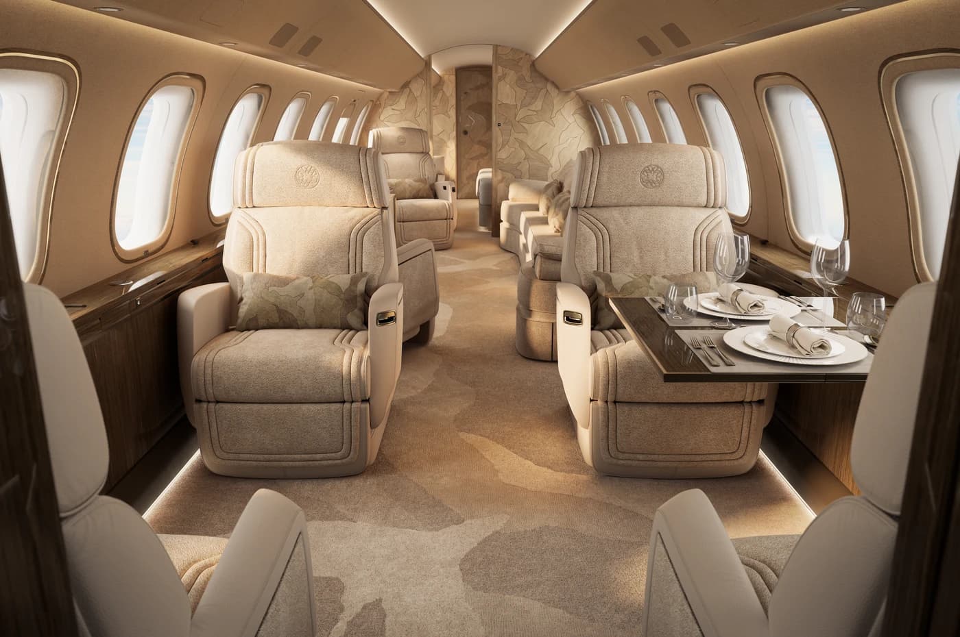 The interior of a Bombardier Global 8000 private jet cabin with a warm color palette, a central lounge area and clean architectural lines designed by ELIE SAAB