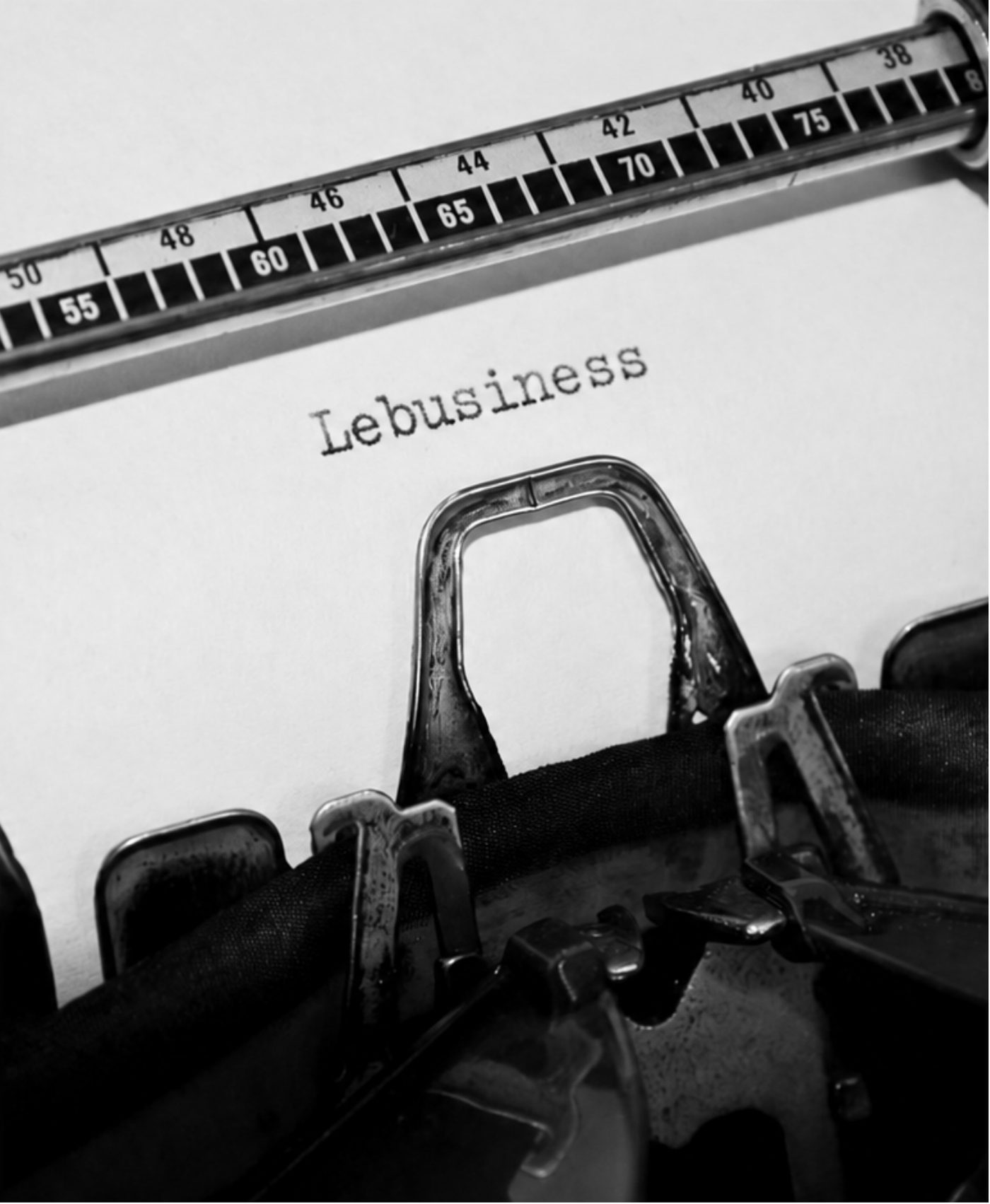 The word Lebusiness typed on a sheet of paper in a vintage typewriter